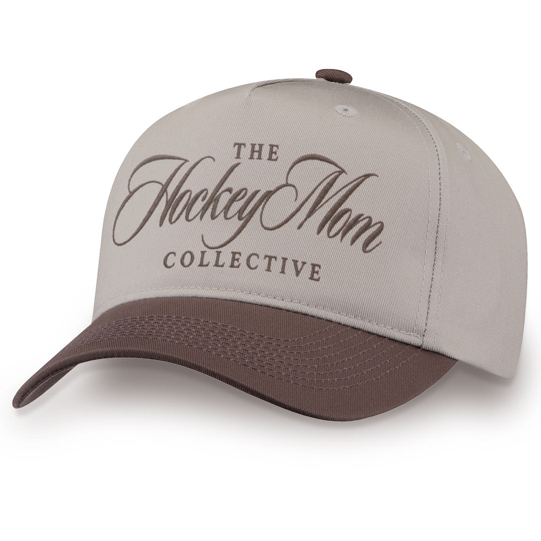 Brown embroidered snapback hat with Hockey Mom stitched across the front