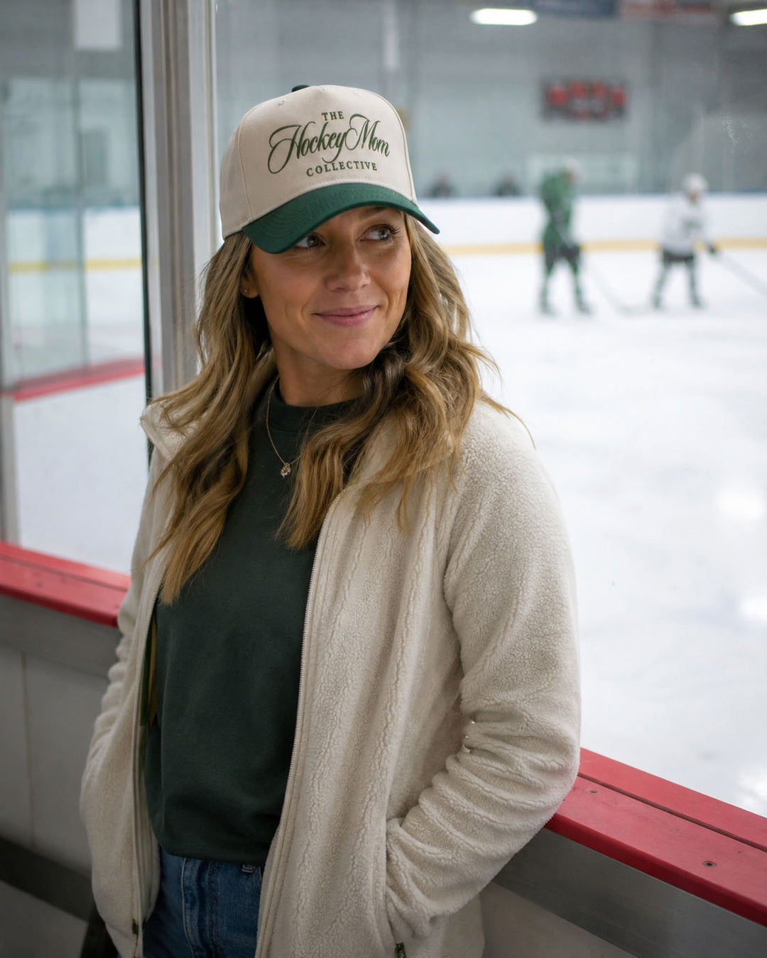 Hockey Mom embroidered snapback hat in Green, worn