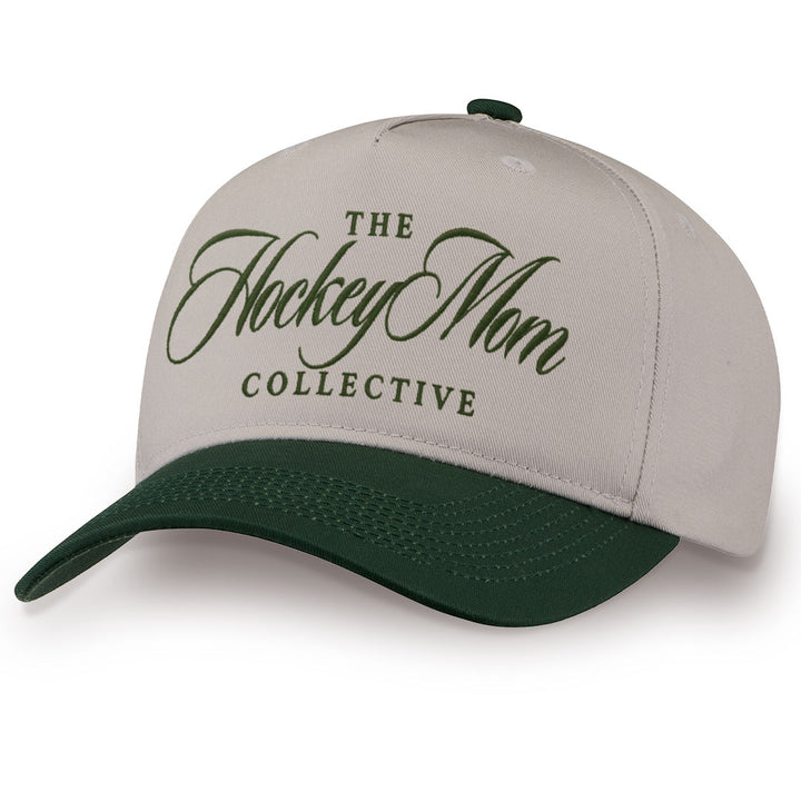 Green embroidered snapback hat with Hockey Mom stitched across the front