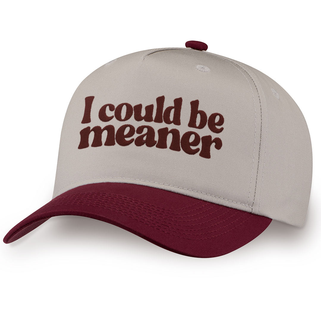 Burgundy embroidered snapback hat with I Could Be Meaner stitched across the front
