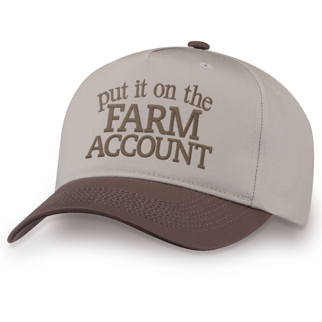 Brown embroidered snapback hat with Farm Account stitched across the front