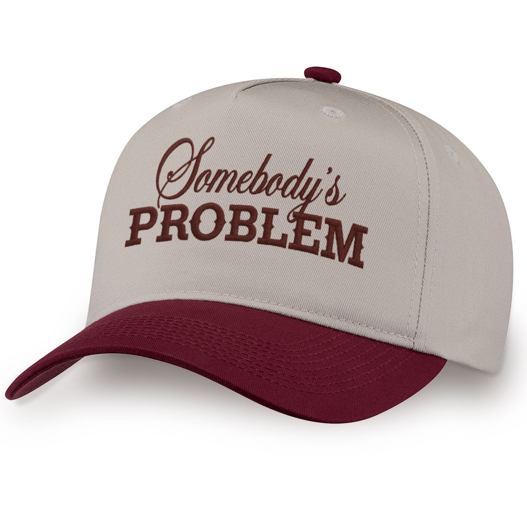 Burgundy embroidered snapback hat with Somebody&