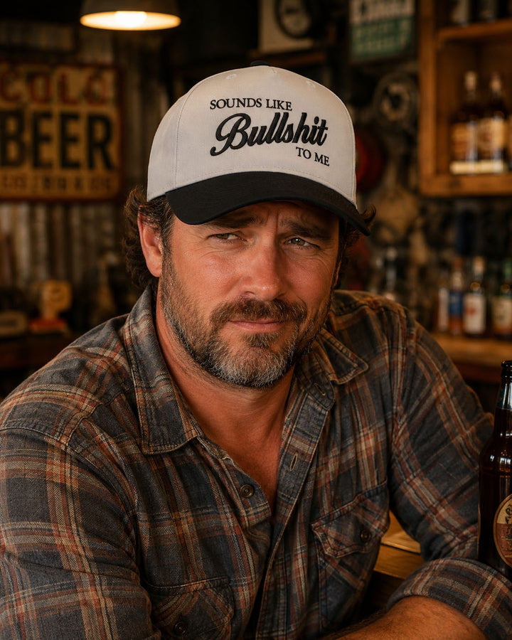 Sounds Like Bullshit embroidered snapback hat in Black, worn