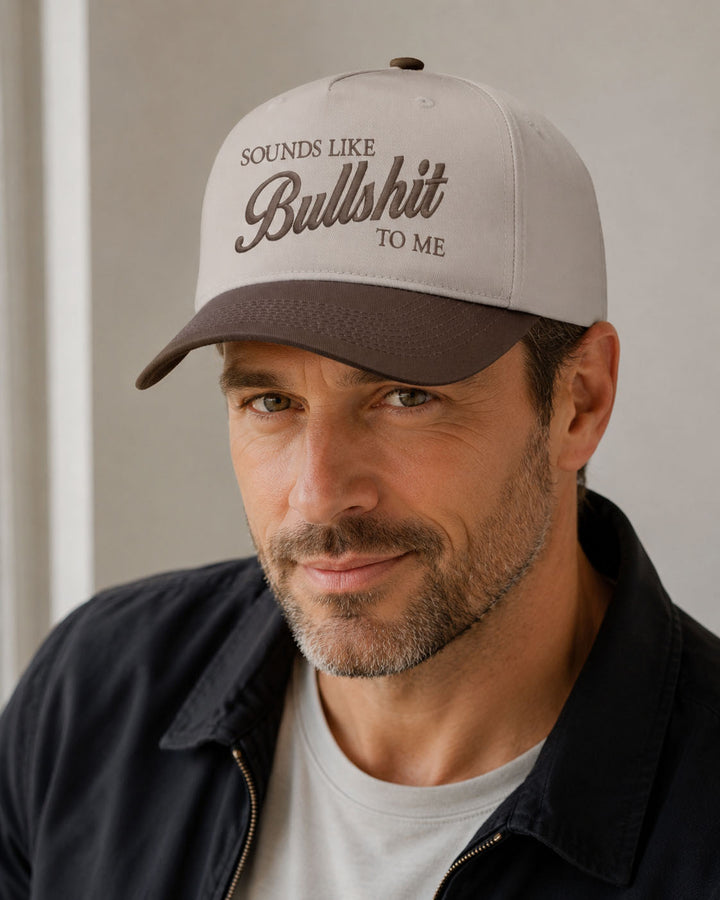 Sounds Like Bullshit embroidered snapback hat in Brown, worn
