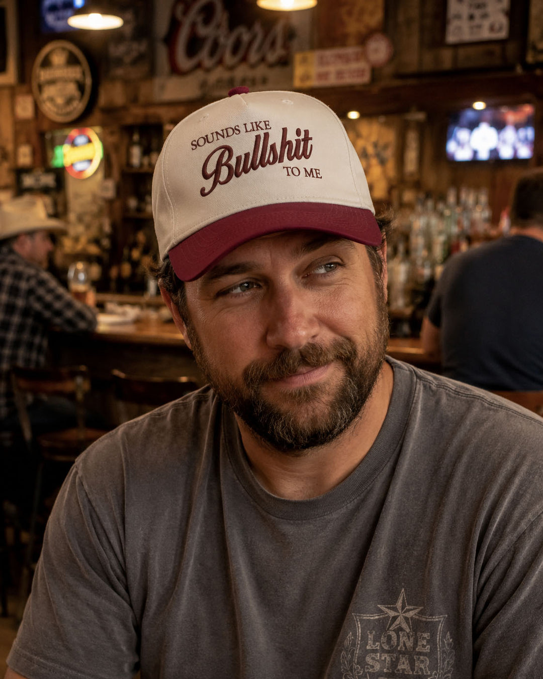 Sounds Like Bullshit embroidered snapback hat in Burgundy, worn