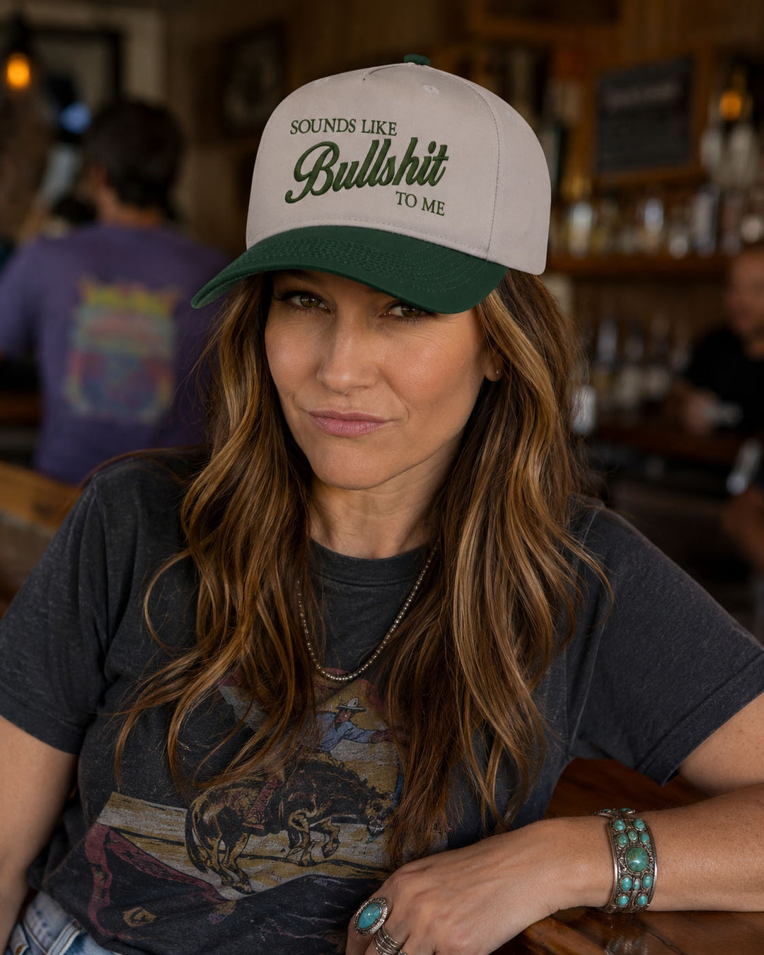 Sounds Like Bullshit embroidered snapback hat in Green, worn