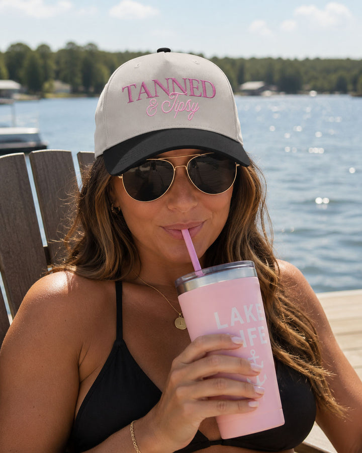 Tanned &amp; Tipsy embroidered snapback hat in Black, worn