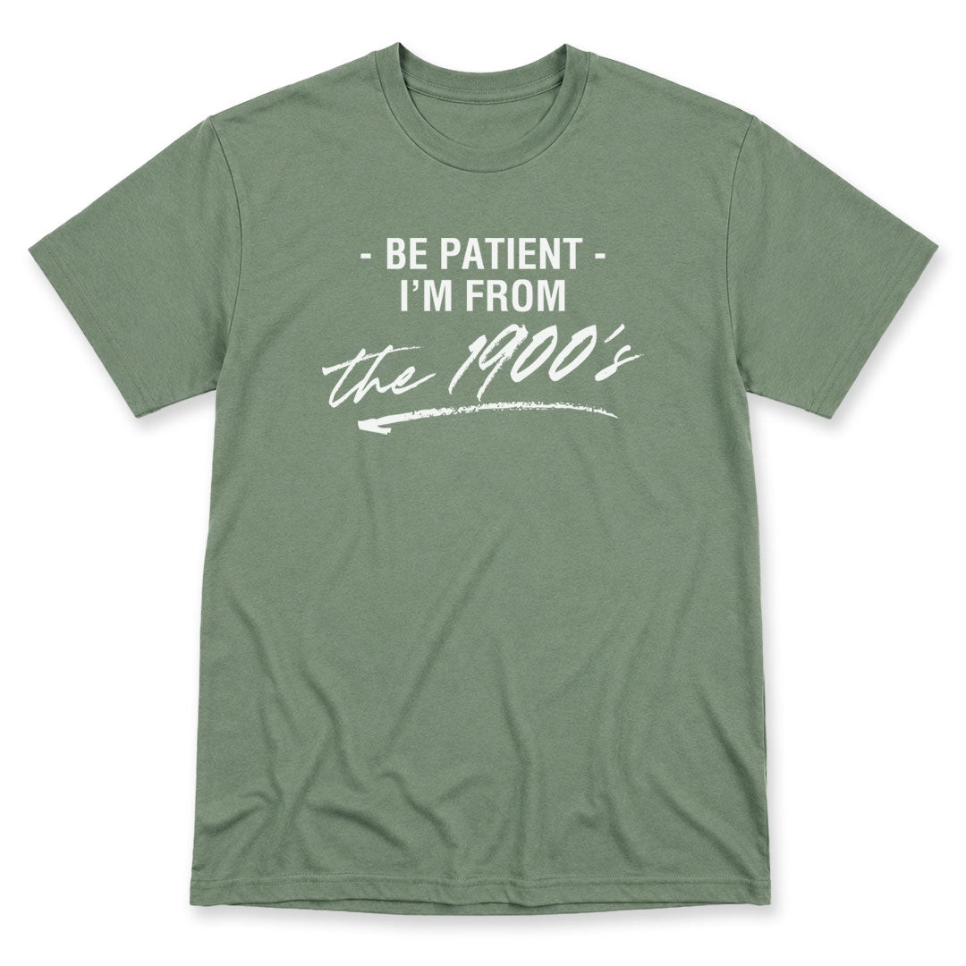 Green t-shirt printed with the Be Patient I'm From The 1900's design, by Pinetree Innovations