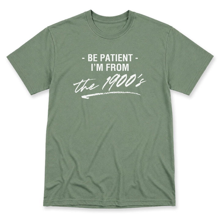 Green t-shirt printed with the Be Patient I&