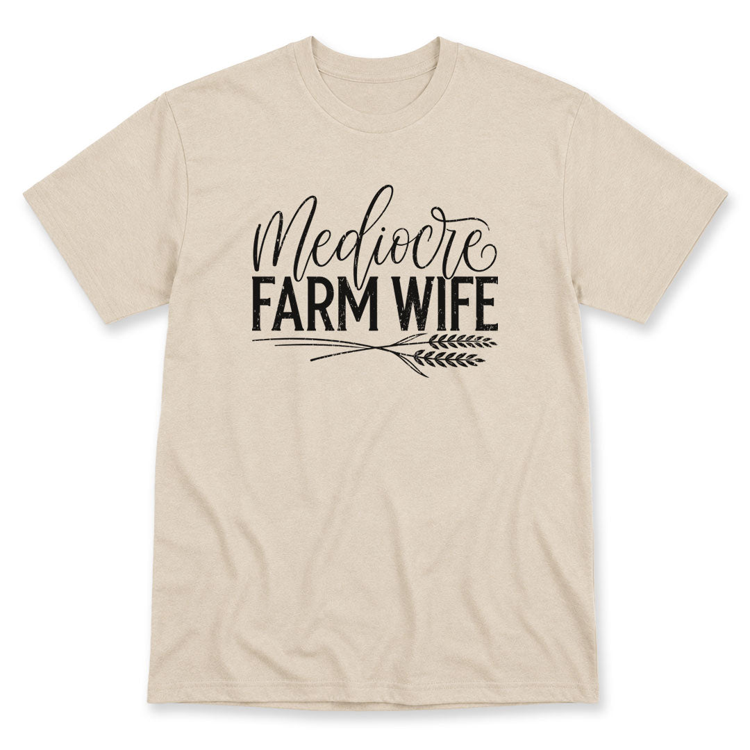 Sand t-shirt printed with the Mediocre Farm Wife design, by Pinetree Innovations