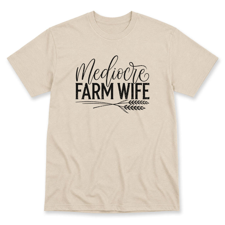 Sand t-shirt printed with the Mediocre Farm Wife design, by Pinetree Innovations