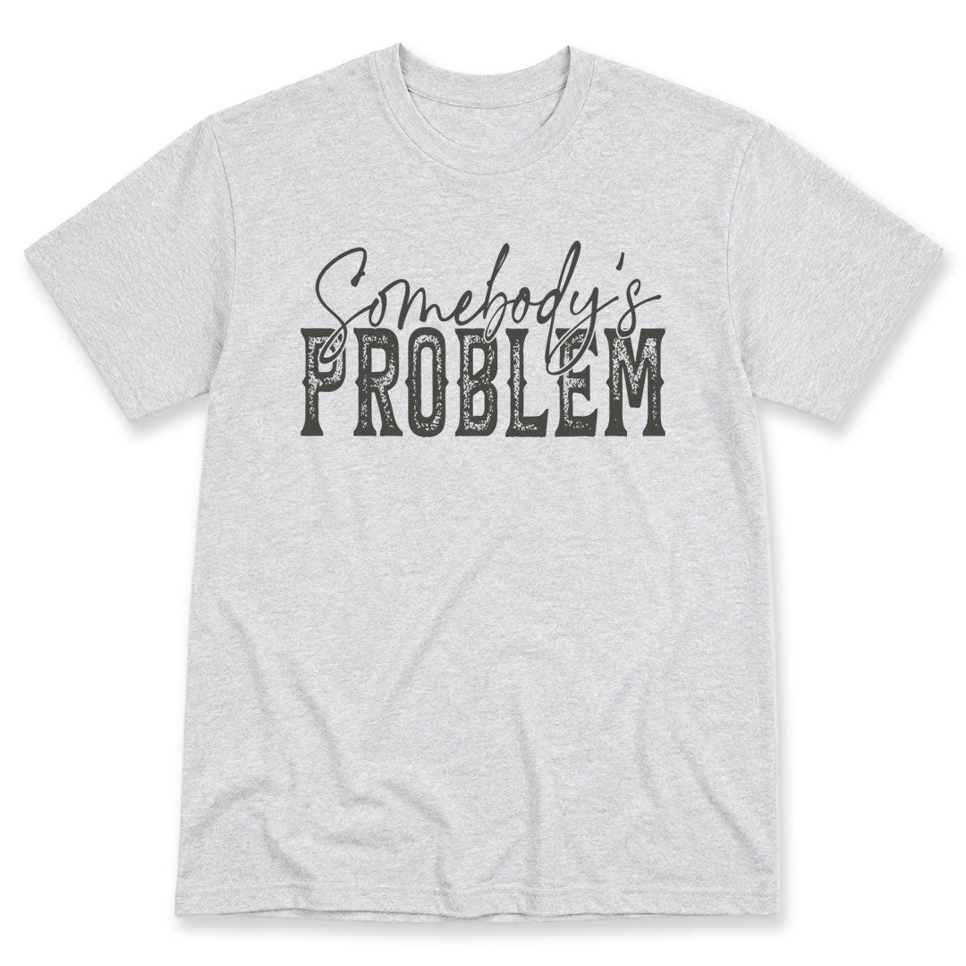 Ash t-shirt printed with the Somebody's Problem design, by Pinetree Innovations