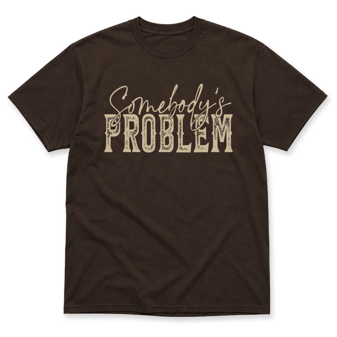 Dark Chocolate t-shirt printed with the Somebody's Problem design, by Pinetree Innovations