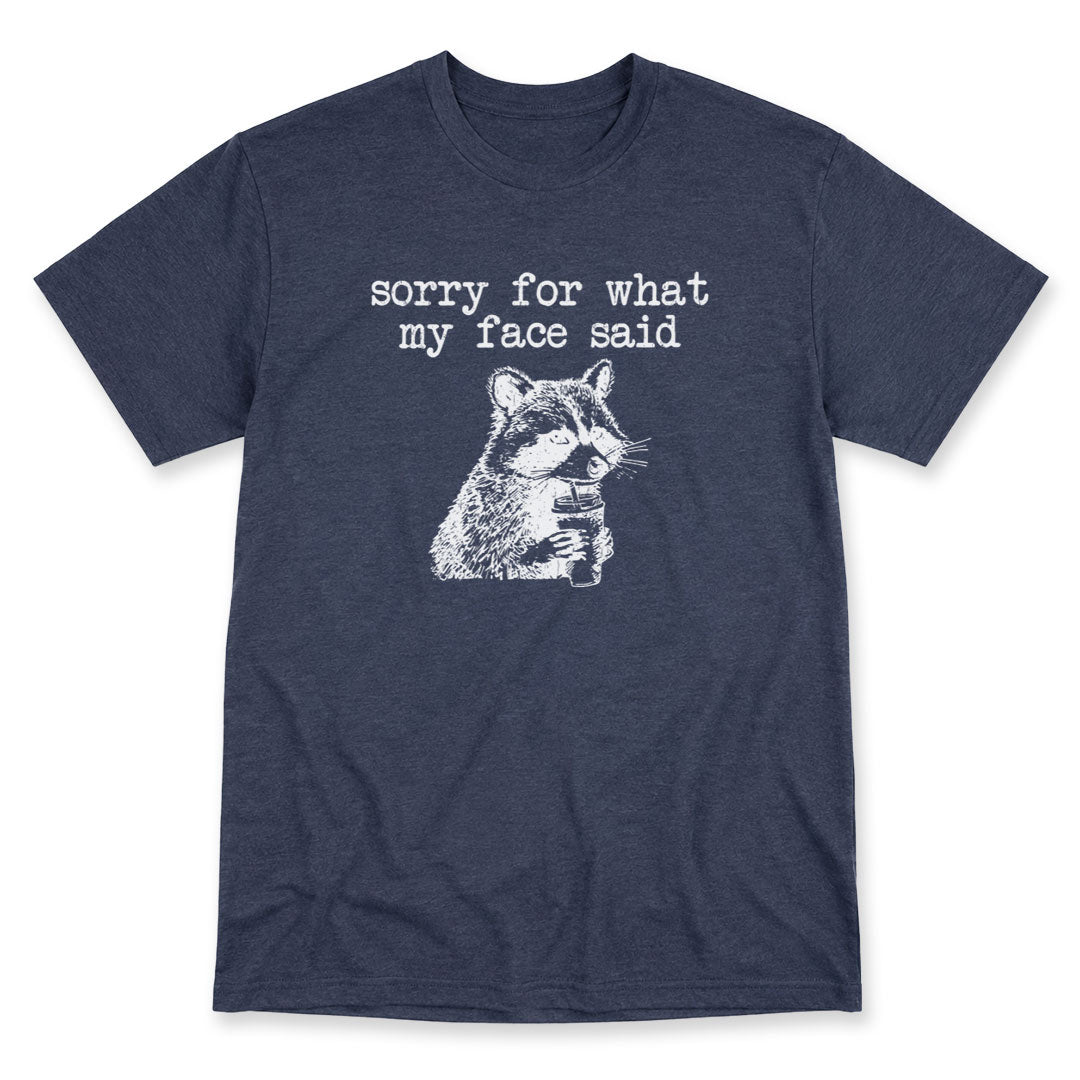 Navy t-shirt printed with the Sorry For What My Face Said design, by Pinetree Innovations