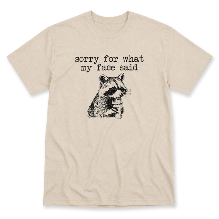 Sand t-shirt printed with the Sorry For What My Face Said design, by Pinetree Innovations