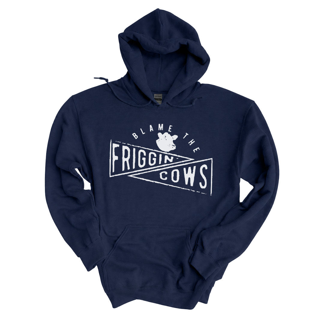 Navy hoodie printed with the Blame The Friggin Cows design across the front