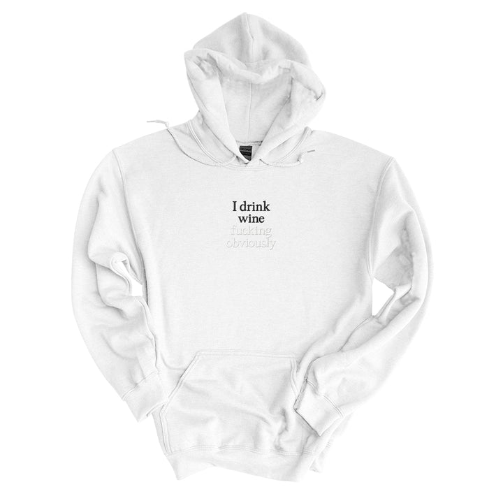 White hoodie embroidered with I drink wine in black thread and fucking obviously in tonal thread below
