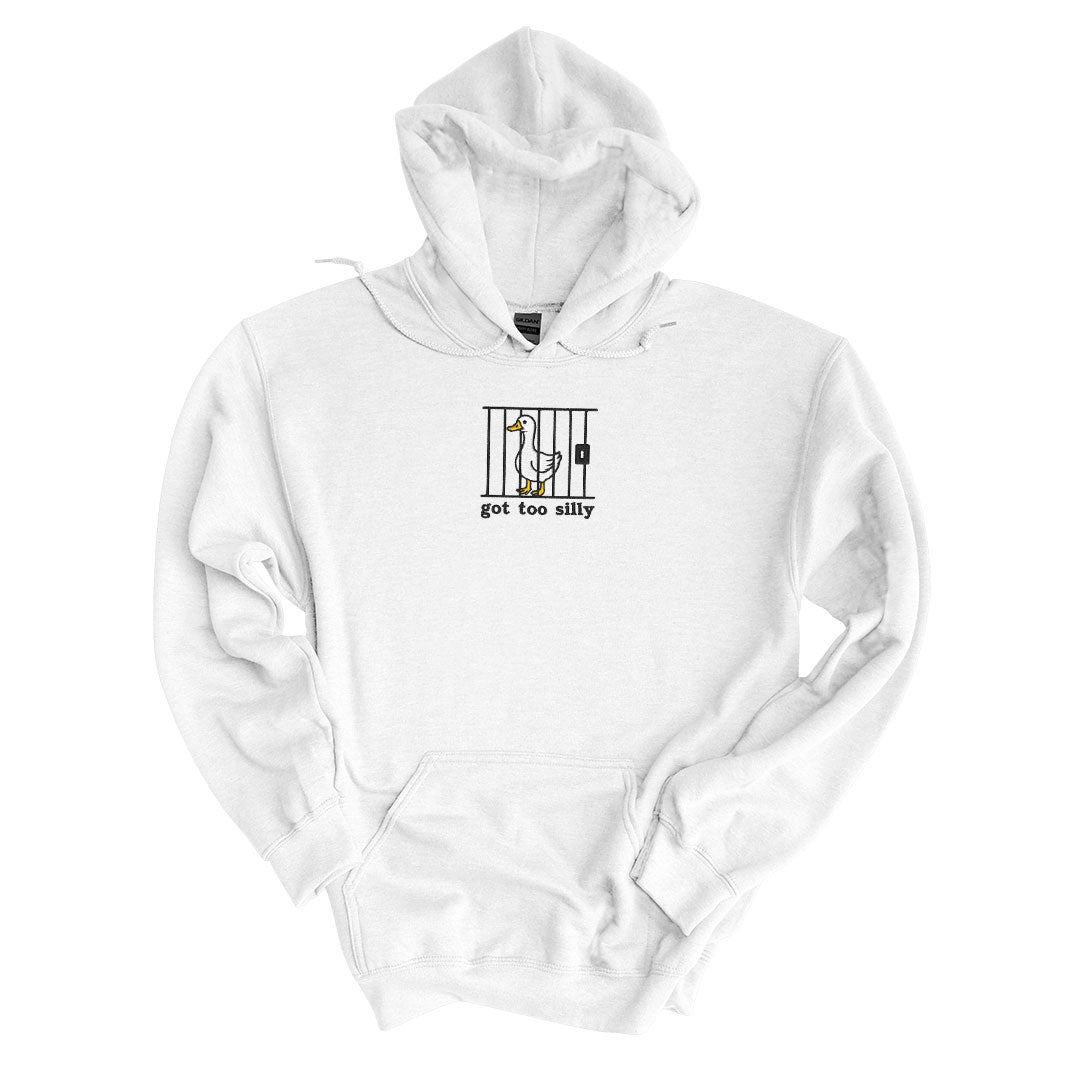 White hoodie with the Got Too Silly design embroidered on the centre chest