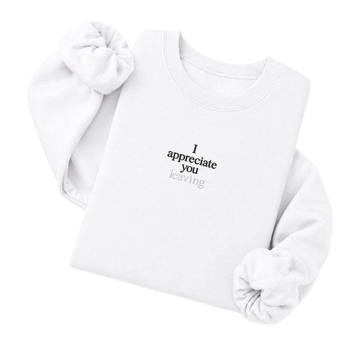 White crewneck sweatshirt embroidered with I appreciate you in black thread and leaving in tonal thread below