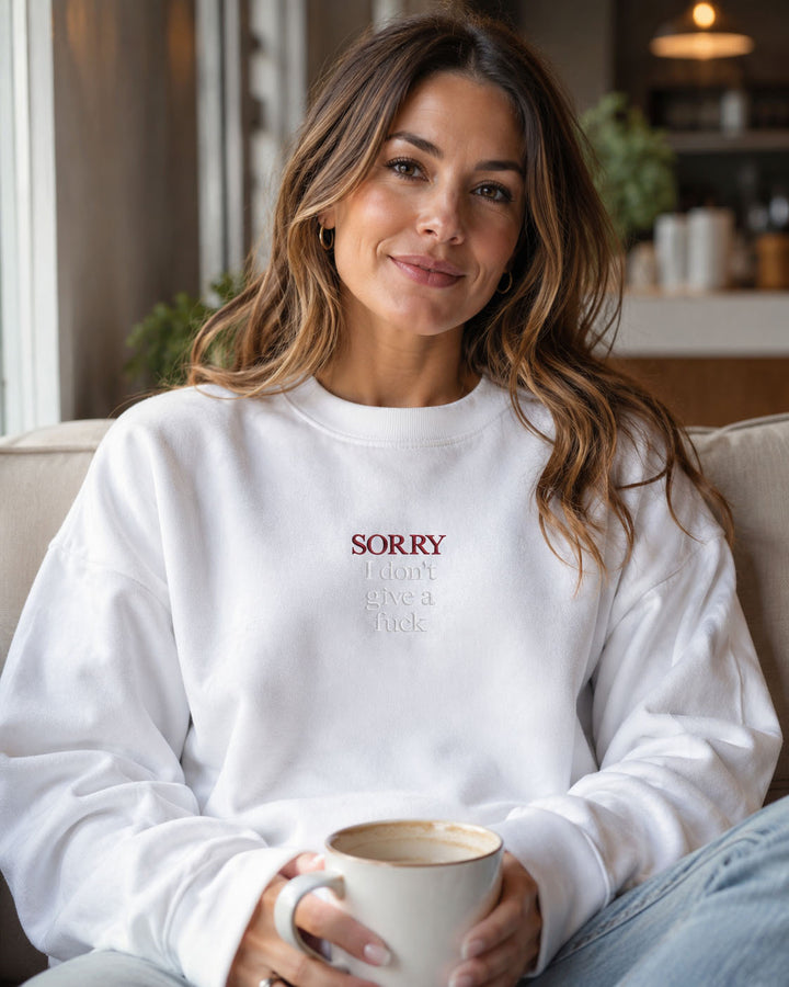 Close-up of What? in the actual fuck embroidery on a Properly Improper crewneck sweatshirt