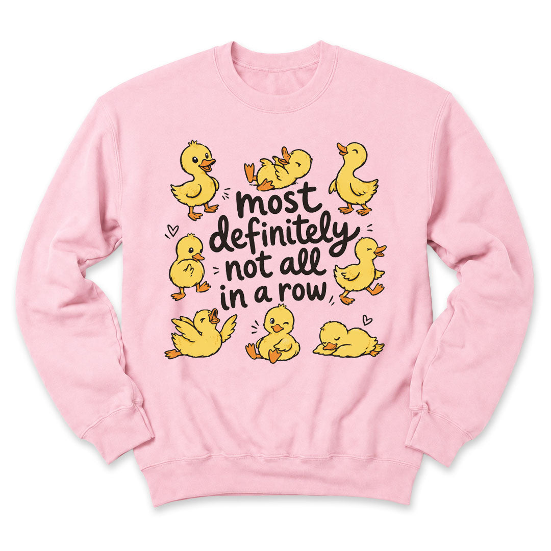 Light Pink crewneck sweatshirt printed with "Most definitely not all in a row" across the front