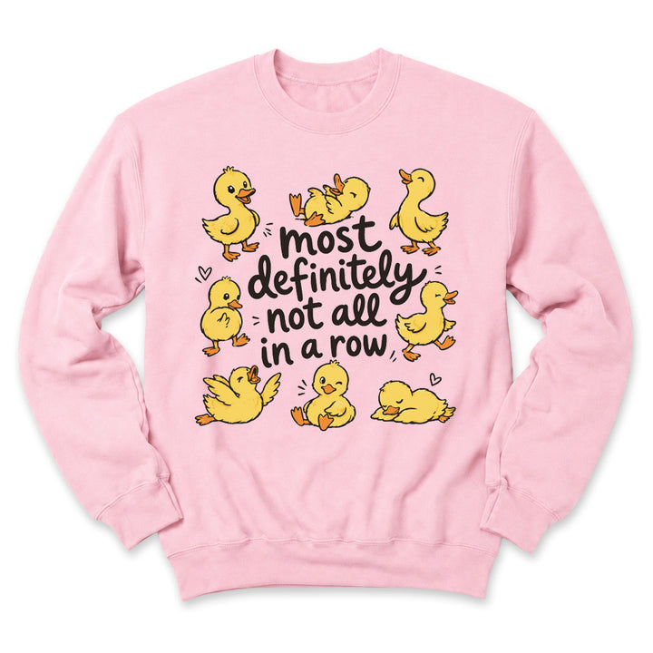 Light Pink crewneck sweatshirt printed with "Most definitely not all in a row" across the front