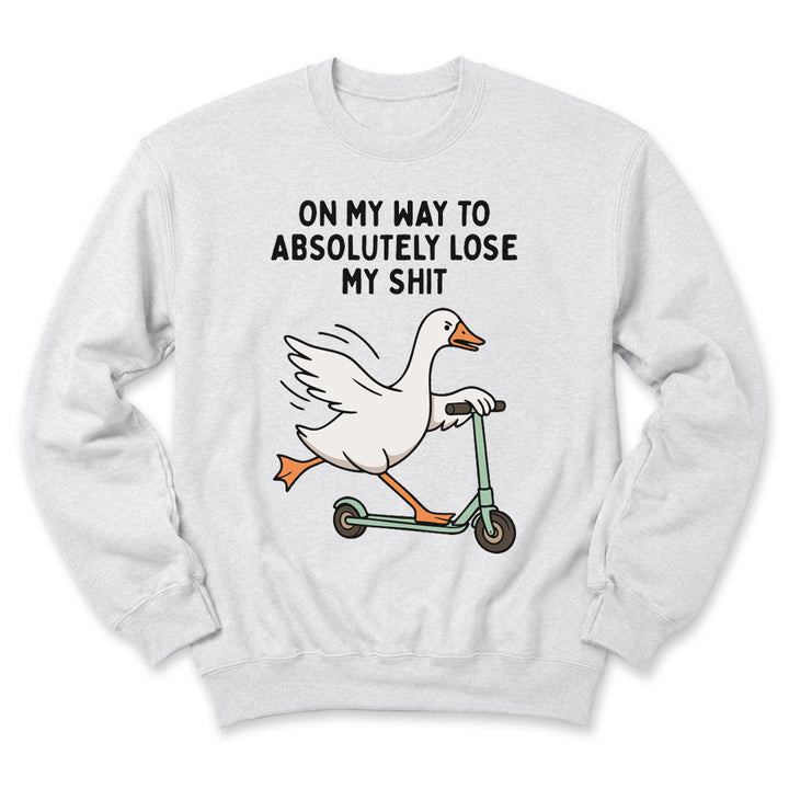Ash crewneck sweatshirt printed with "On My Way To Absolutely Lose My Shit" across the front