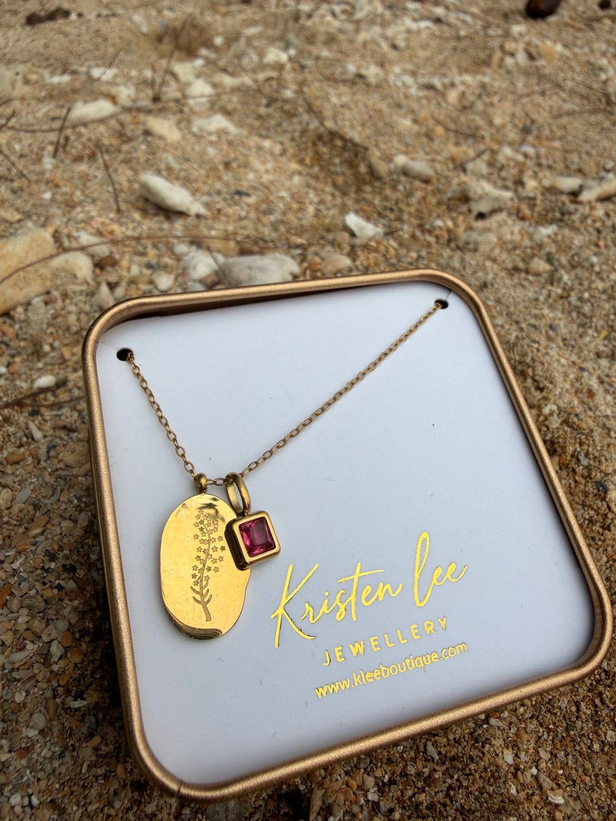 Gold birth month flower necklace in Kristen Lee Jewellery gift box