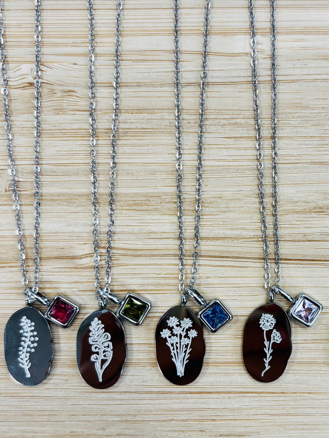 Silver birth month flower necklaces with birthstone charms