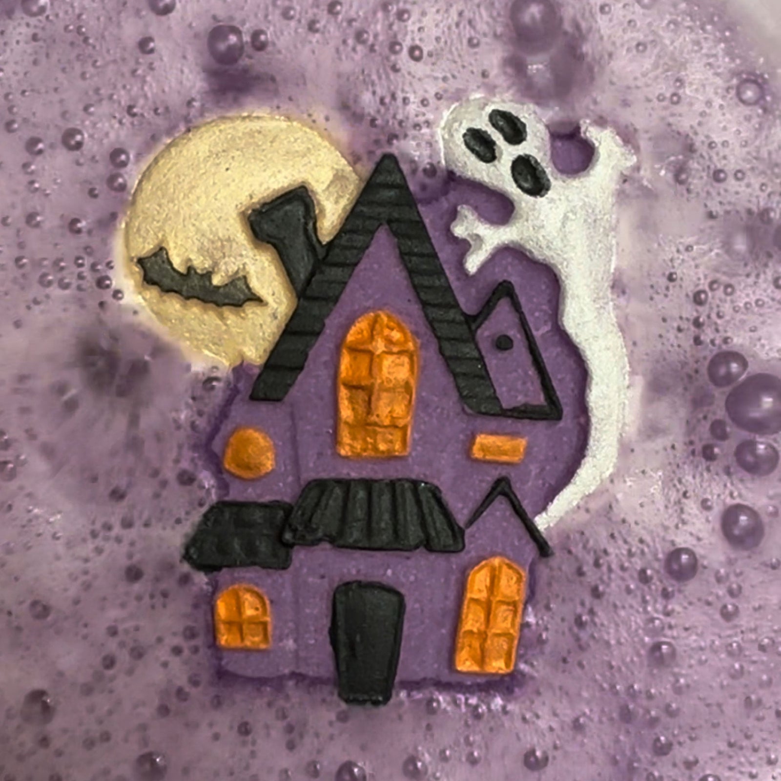 Halloween Mini Haunted House bath bomb fizzing in the bath