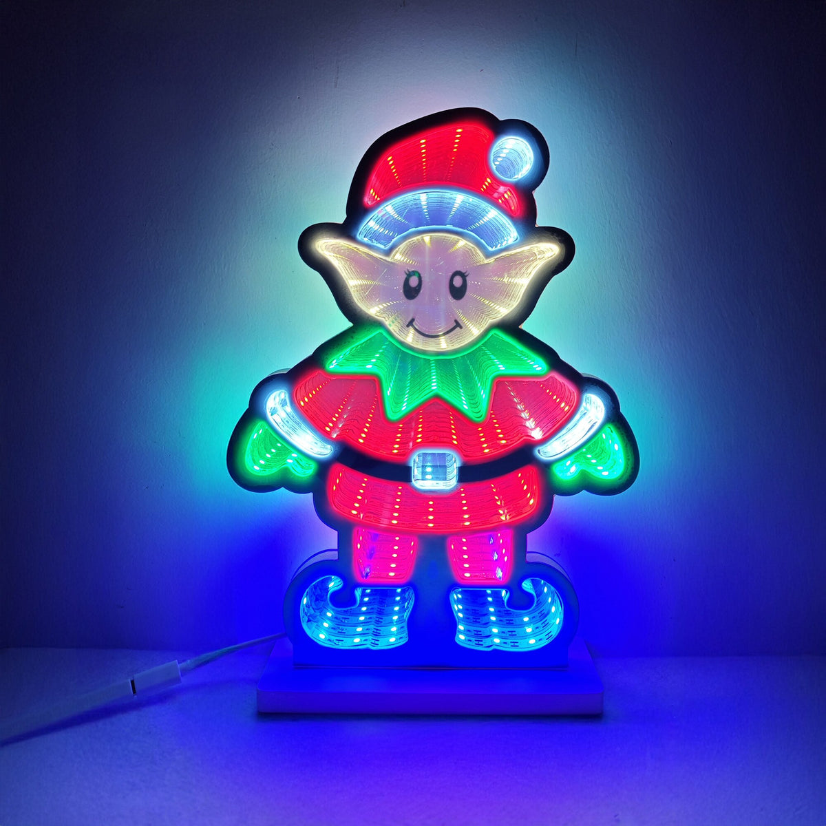 LED infinity mirror light in the shape of a Christmas elf