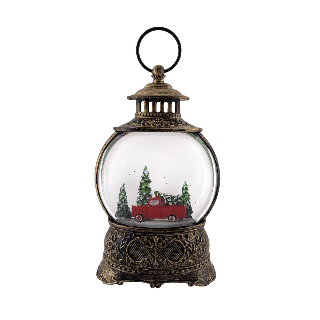 Lit water lantern with a red truck and Christmas tree and glitter spinner