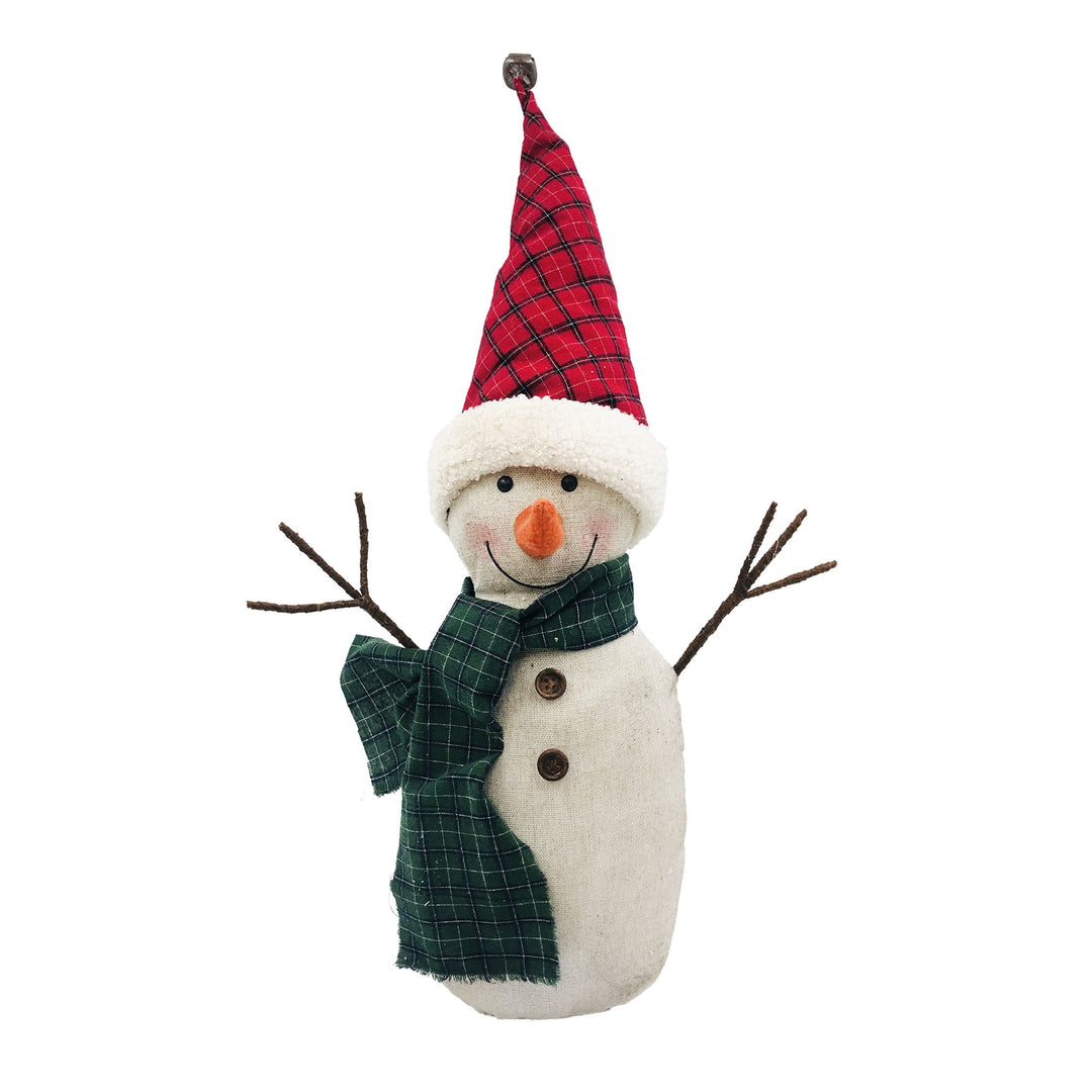 Cream fabric snowman in a tall red buffalo-check hat and green plaid scarf